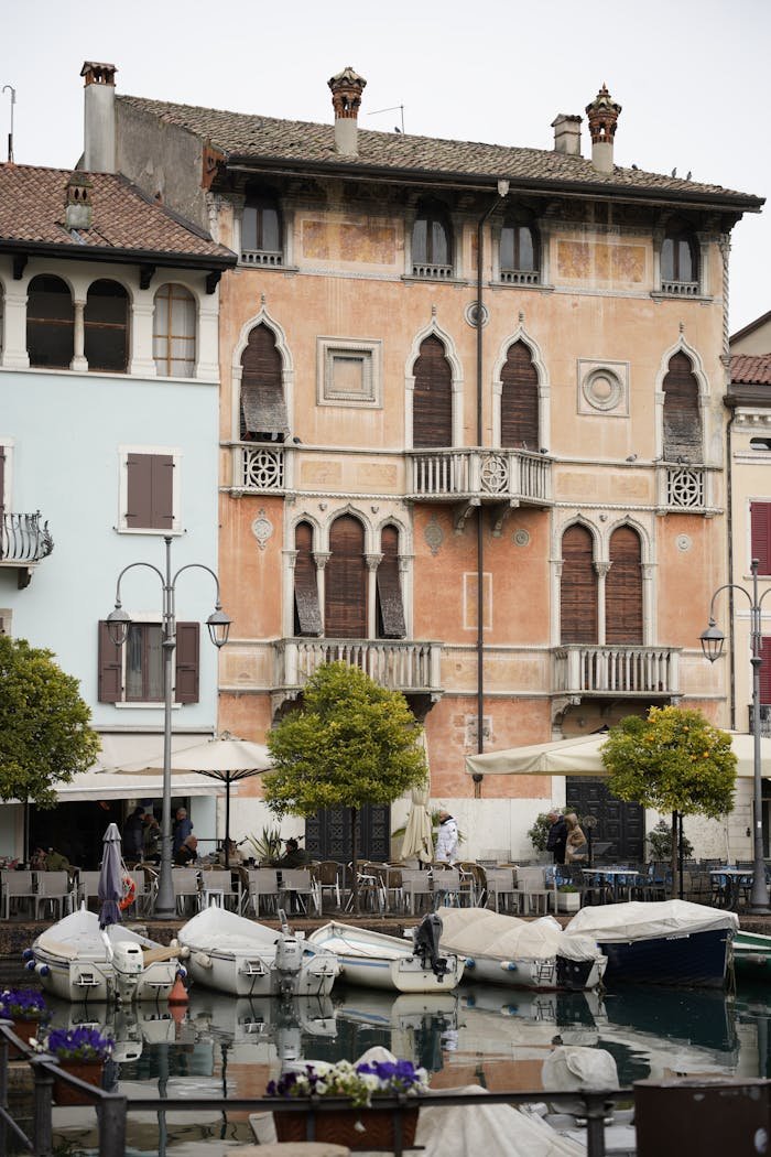 Charming Venetian-style architecture by the waterfront in Desenzano del Garda, Italy.