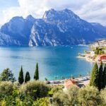 Breathtaking view of Riva del Garda with mountains and Lake Garda in Trentino-Alto Adige, Italy.