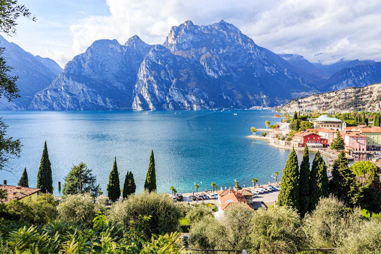 Breathtaking view of Riva del Garda with mountains and Lake Garda in Trentino-Alto Adige, Italy.
