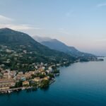Scenic aerial view of a charming lakeside town along the coast of Lake Garda, Italy.