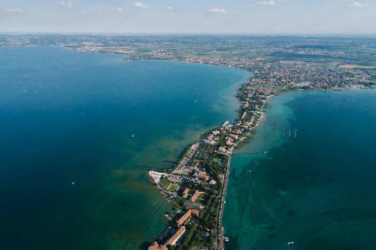 Breathtaking aerial view of Sirmione, a peninsula on Lake Garda in Italy, showcasing its scenic beauty.